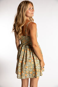 Sophie is wearing the Sundara Cotton Mini Dress in Jade S/M
