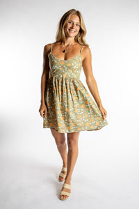 Sophie is wearing the Sundara Cotton Mini Dress in Jade S/M