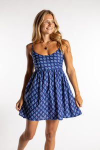 Sophie is wearing the Sundara Cotton Mini Dress in Royal Blue S/M