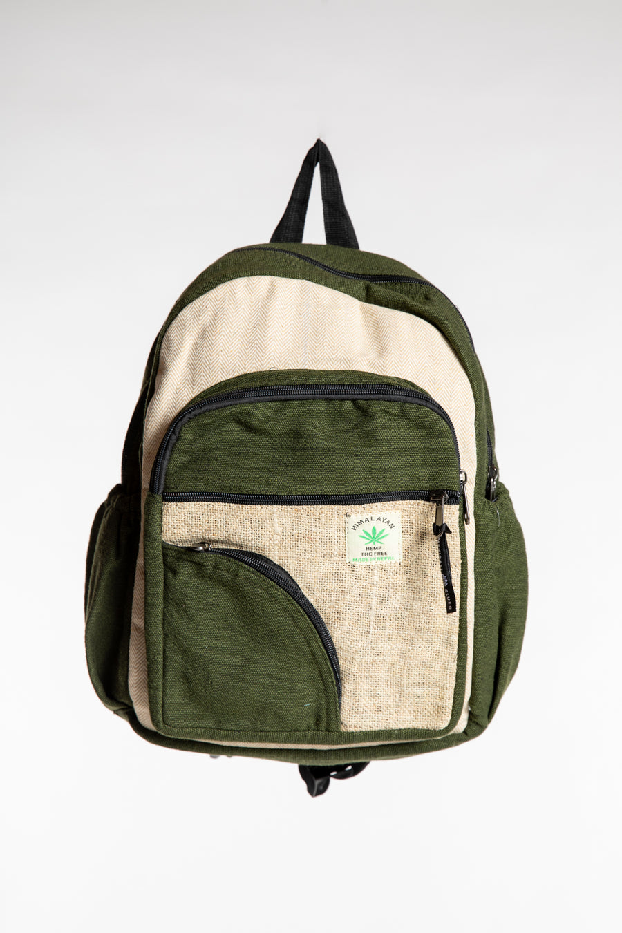 Green hemp backpack with contrasting cream panels, black trim and front zippered pockets