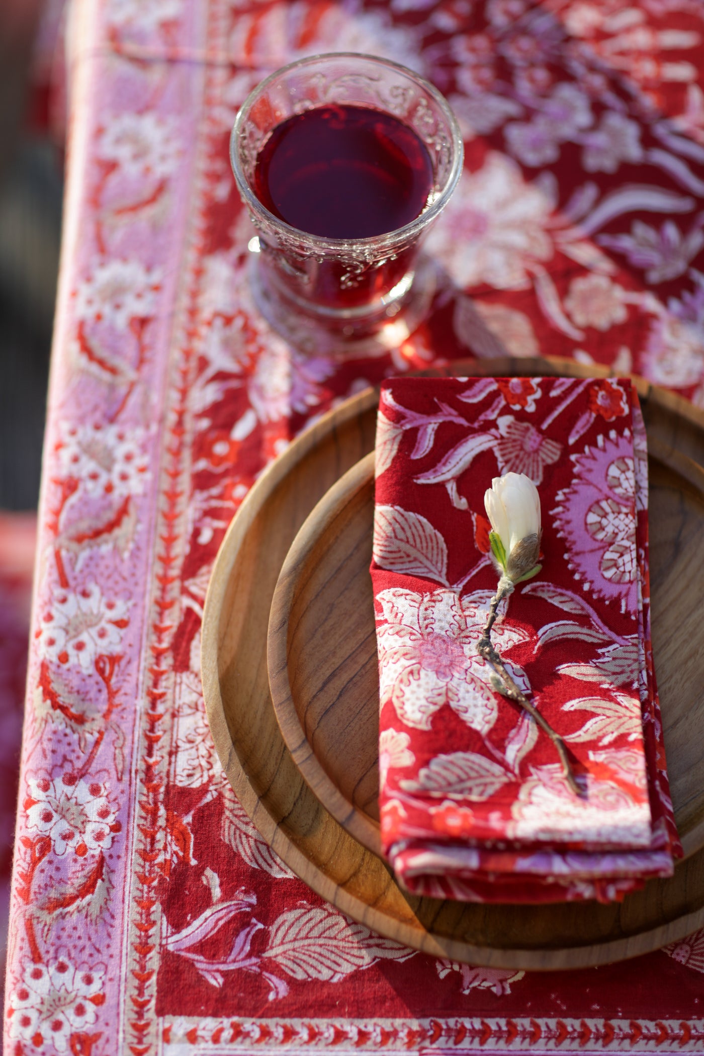 Block print napkin and tablecloth in garnet profusion