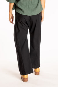 Sophie is wearing the Black Thai Fisherman Pocket Pants 