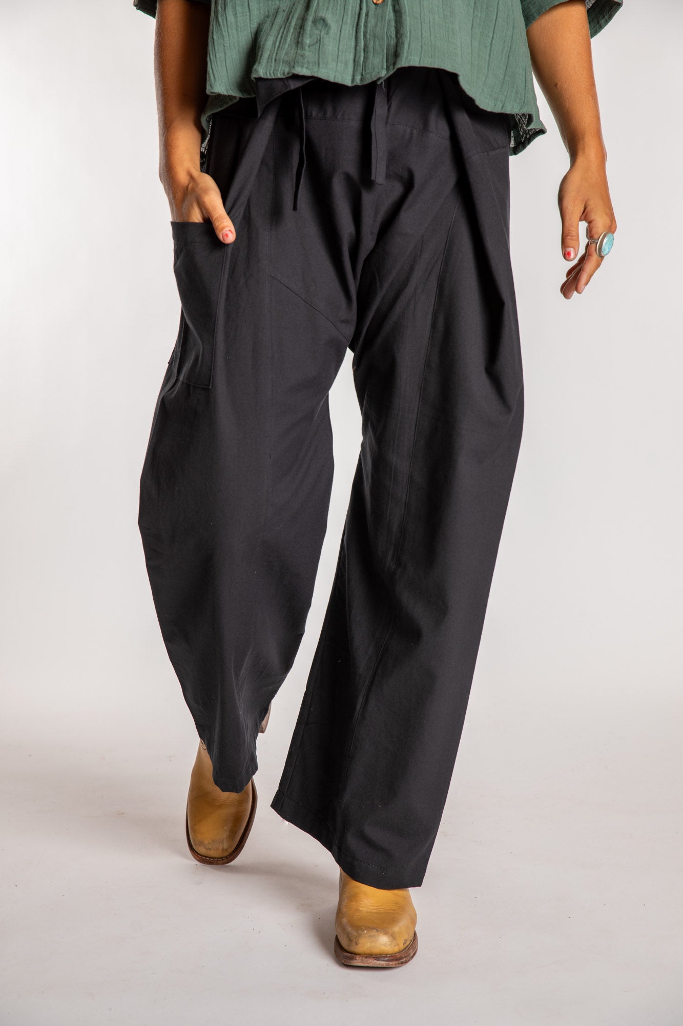 Sophie is wearing the Black Thai Fisherman Pocket Pants 