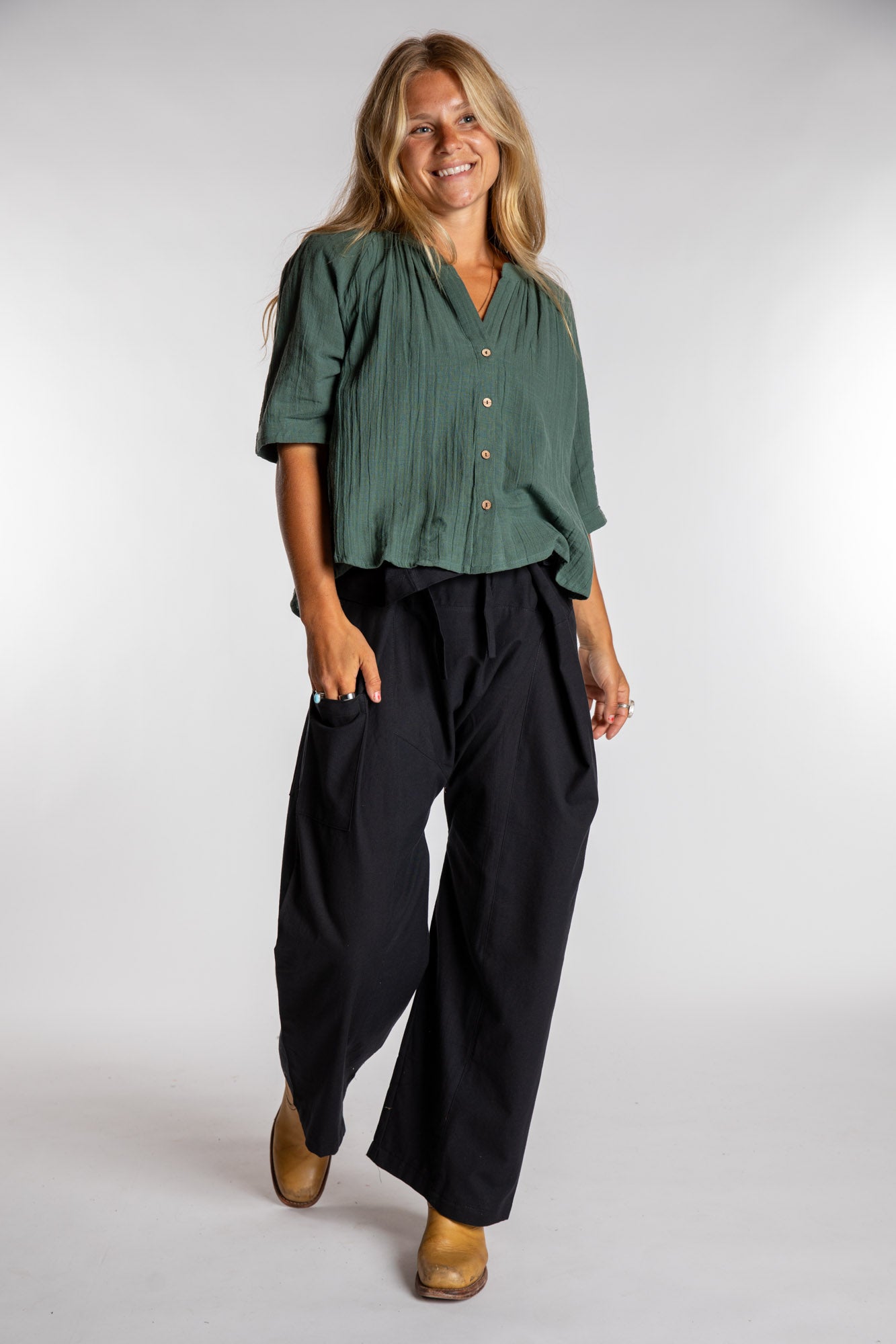 Sophie is wearing the Black Thai Fisherman Pocket Pants 