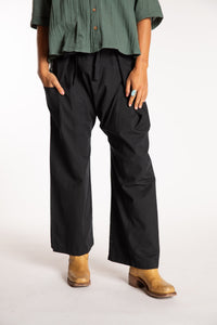 Sophie is wearing the Black Thai Fisherman Pocket Pants 