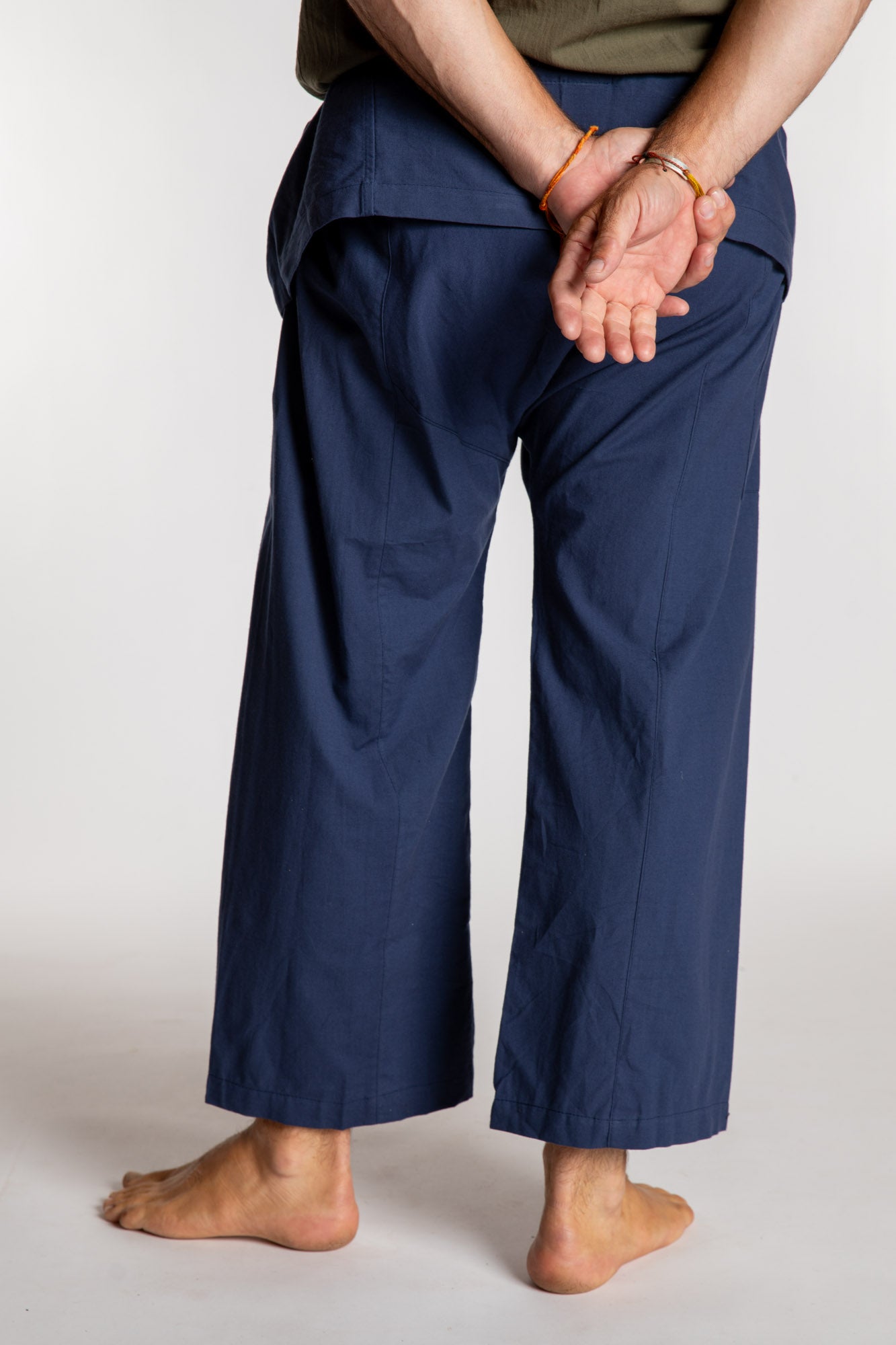 Topher is wearing the Dark Blue Thai Fisherman Pocket Pants 