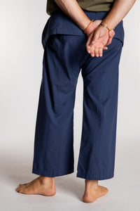 Topher is wearing the Dark Blue Thai Fisherman Pocket Pants 