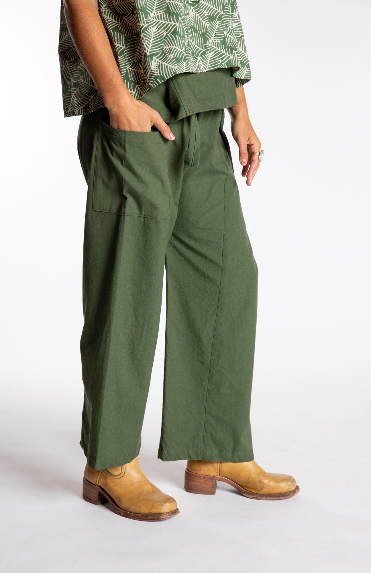Sophie is wearing the Olive Thai Fisherman Pocket Pants 