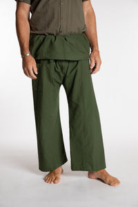 Topher is wearing the Olive Thai Fisherman Pocket Pants 