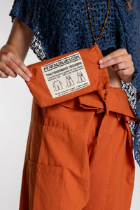 Emily is wearing the Rust Thai Fisherman Pocket Pants 