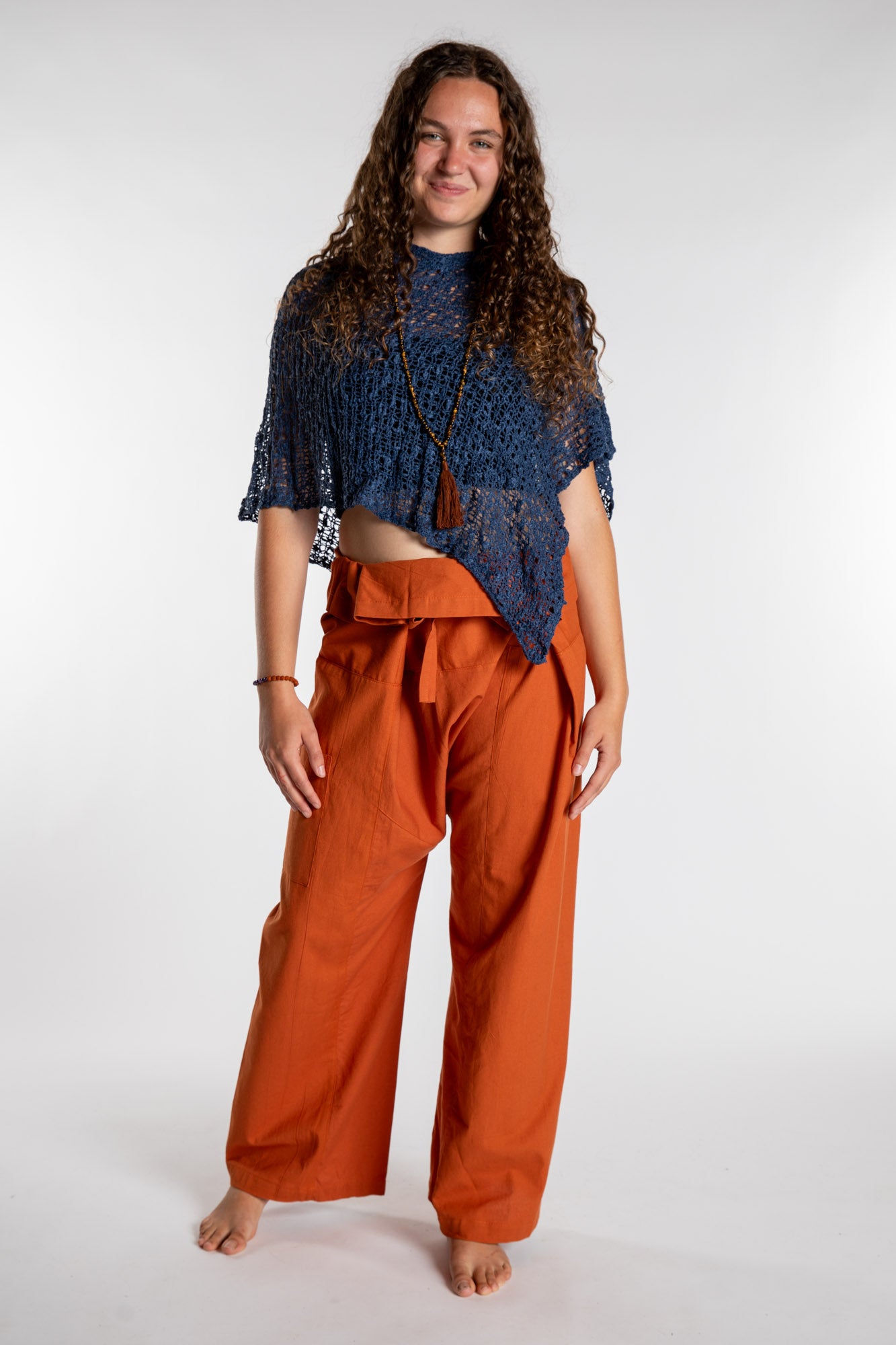 Emily is wearing the Rust Thai Fisherman Pocket Pants 