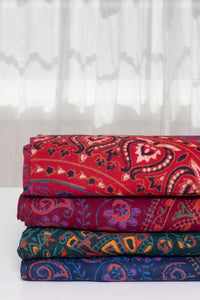 Block print elephant mandala tapestries in red, maroon, green, and blue