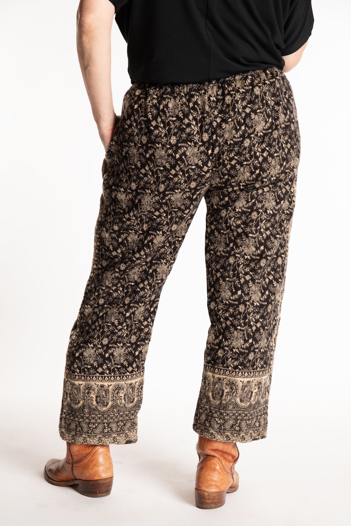 Susan is wearing the L/XL Veda Soft Brushed Pants in Black