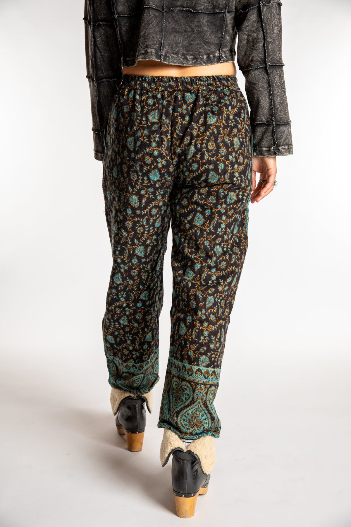 Sophie is wearing the S/M Veda Soft Brushed Pants in Black and Blue