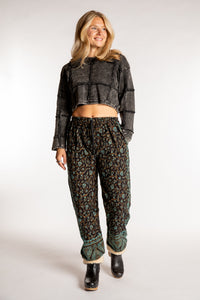 Sophie is wearing the S/M Veda Soft Brushed Pants in Black and Blue