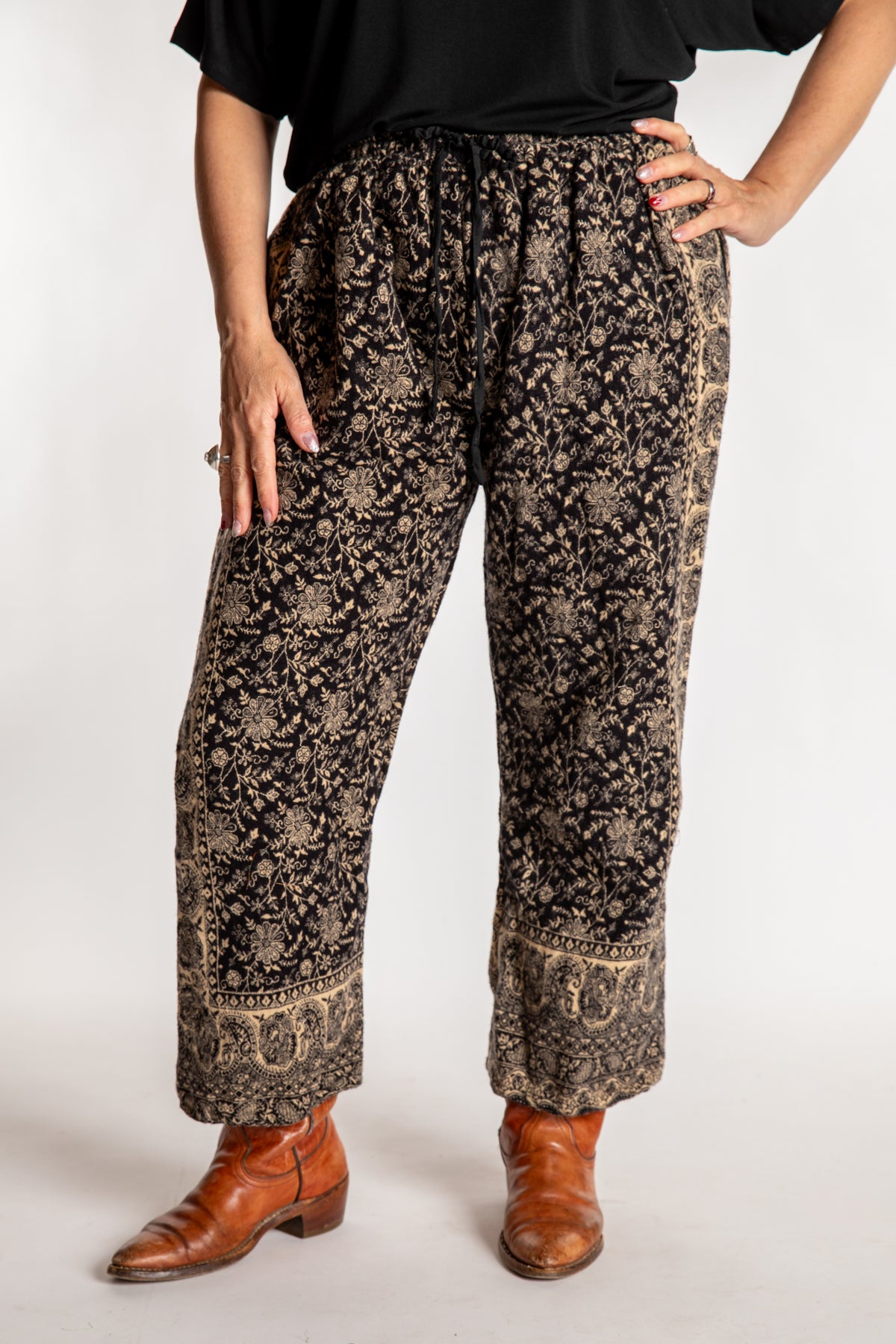Susan is wearing the L/XL Veda Soft Brushed Pants in Black