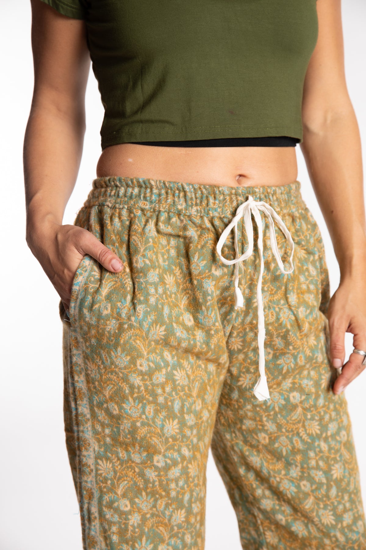 Sophie is wearing the S/M Veda Soft Brushed Pants in Green