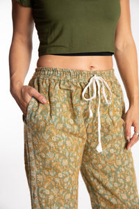 Sophie is wearing the S/M Veda Soft Brushed Pants in Green