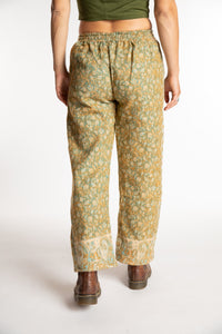 Sophie is wearing the S/M Veda Soft Brushed Pants in Green