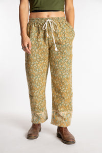 Sophie is wearing the S/M Veda Soft Brushed Pants in Green