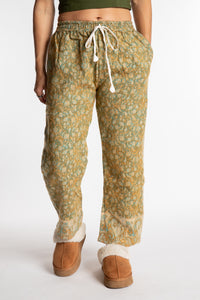 Sophie is wearing the S/M Veda Soft Brushed Pants in Green