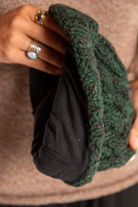 Sophie is wearing the Wharfside Cable Knit Wool Beanie in Forest Green 