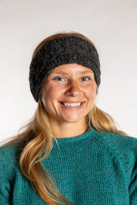 Sophie is wearing the Wharfside Cable Knit Wool Headband in Charcoal