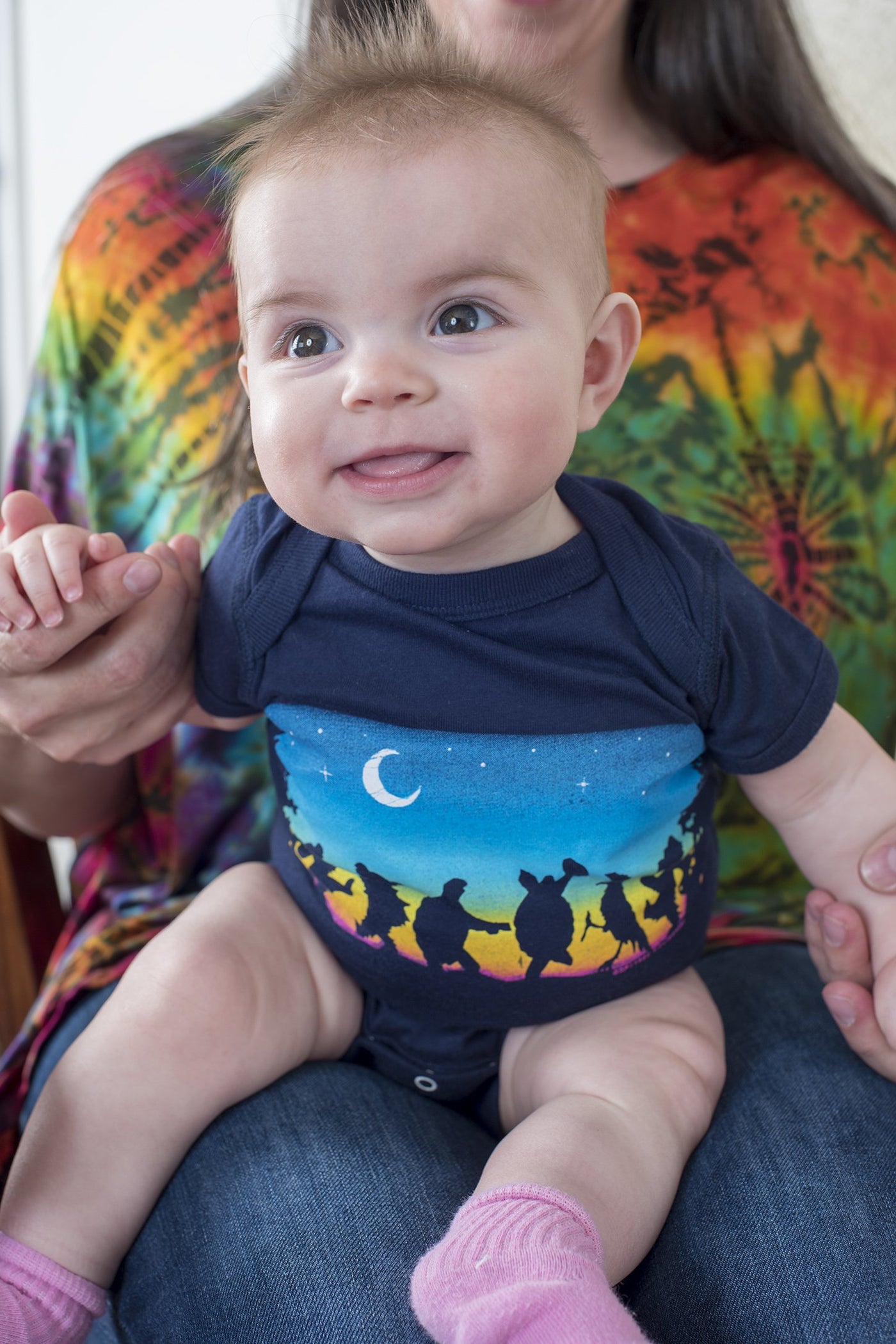 Arlo is wearing a Grateful Dead baby one piece