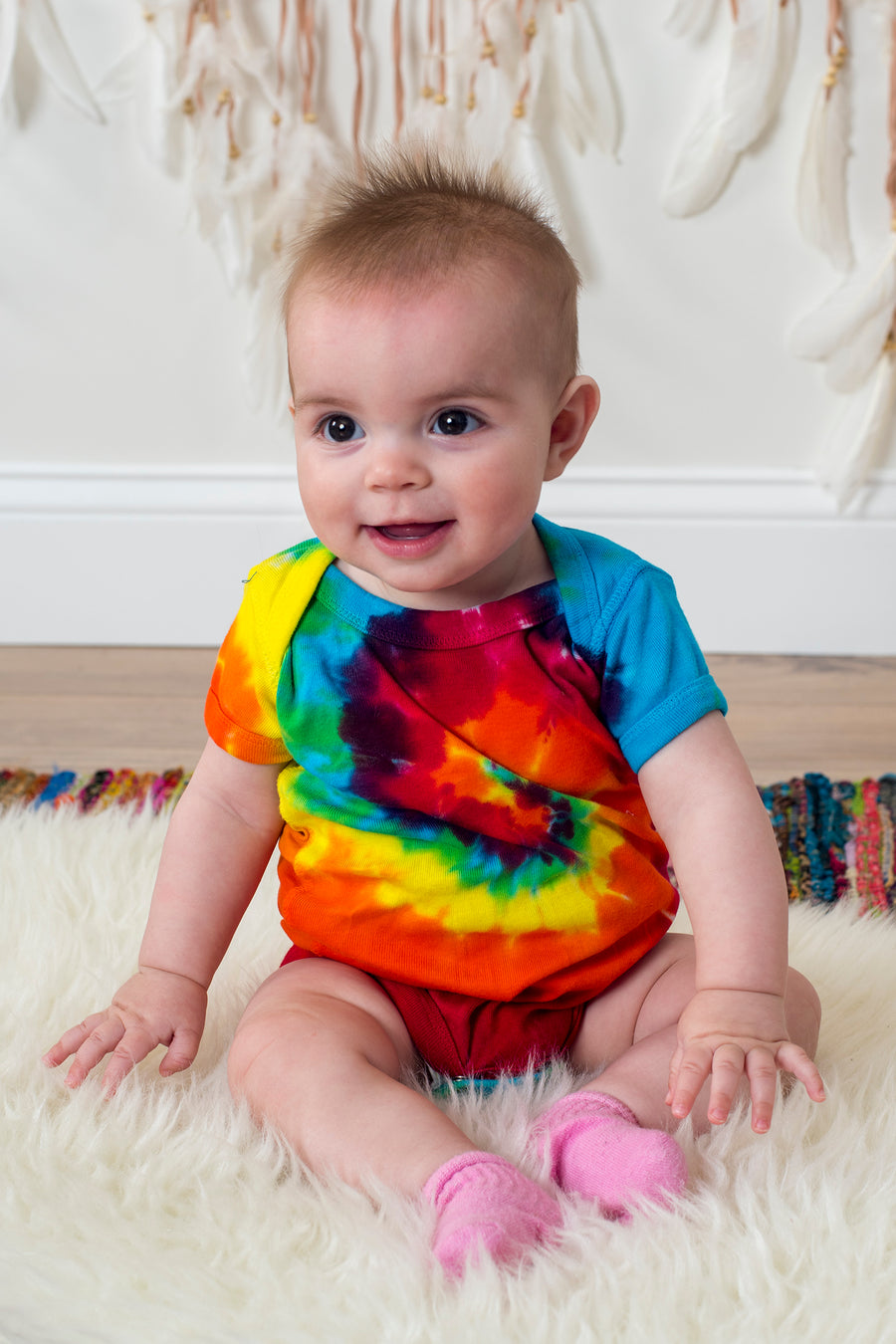 rainbow-spiral-baby-one-piece