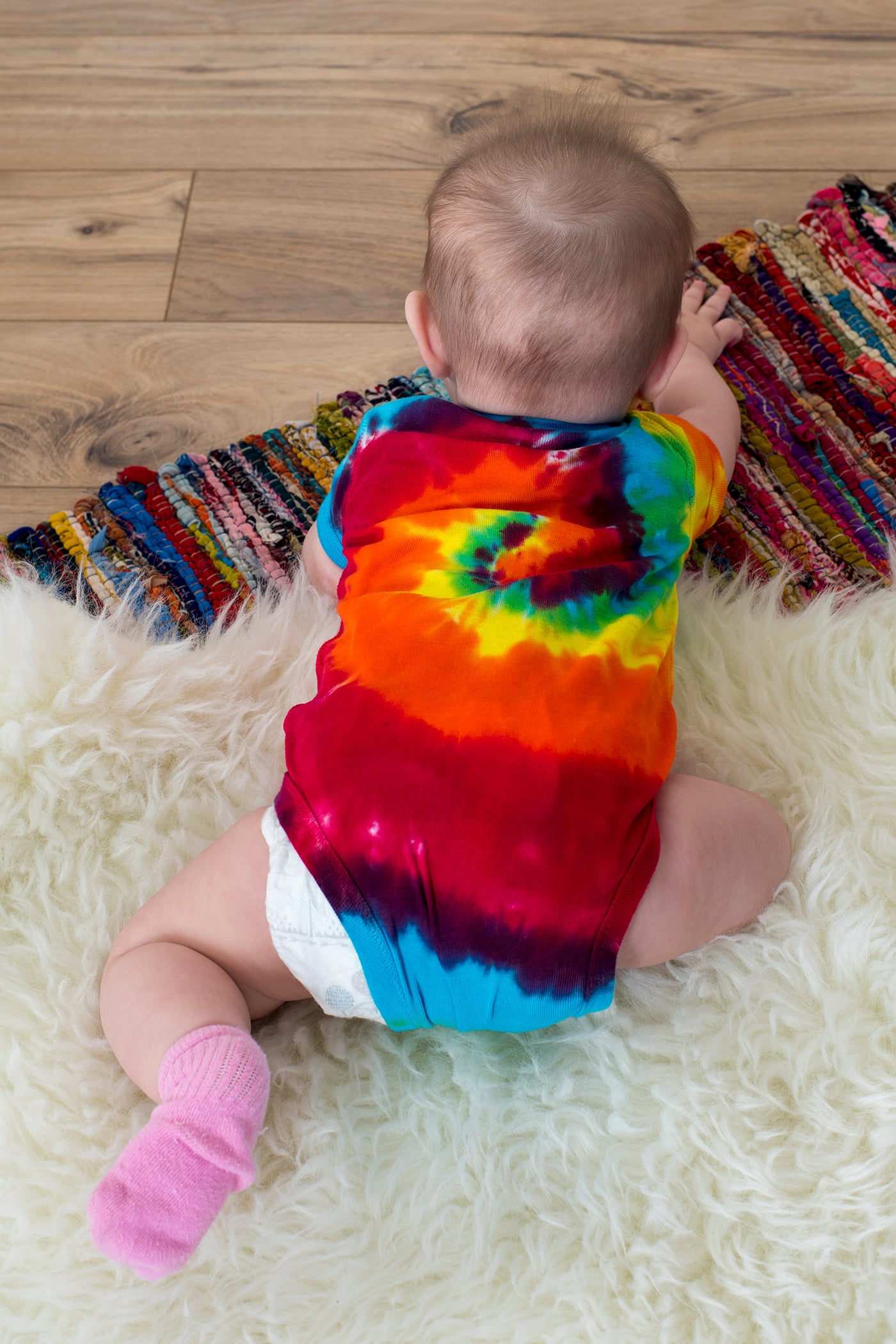 rainbow-spiral-baby-one-piece