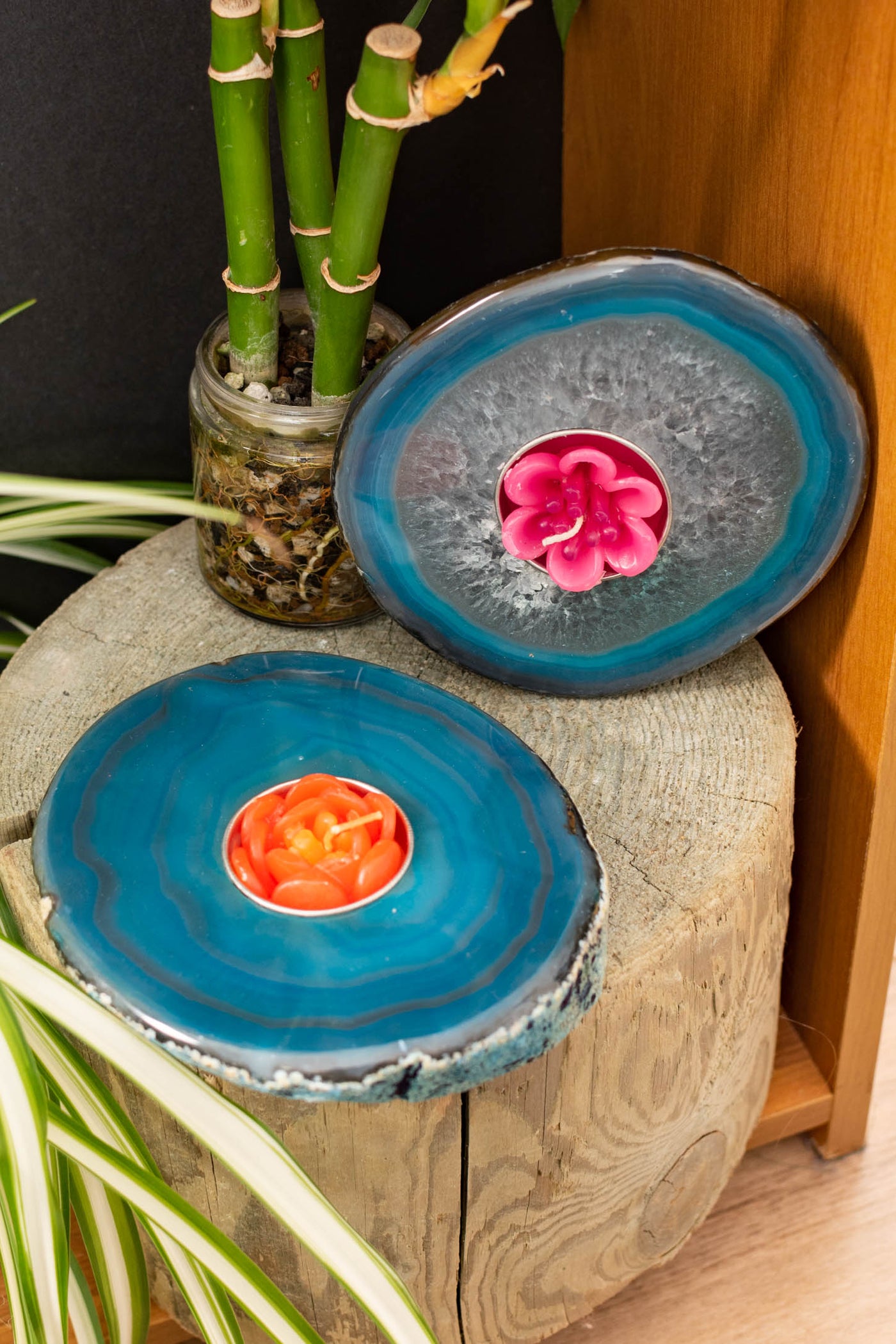 Polished agate tea light holders in teal
