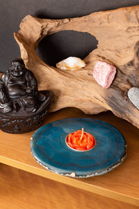 Polished agate tea light holders in teal