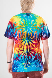 Chauncey is wearing size L rainbow crackle tie dye t shirt