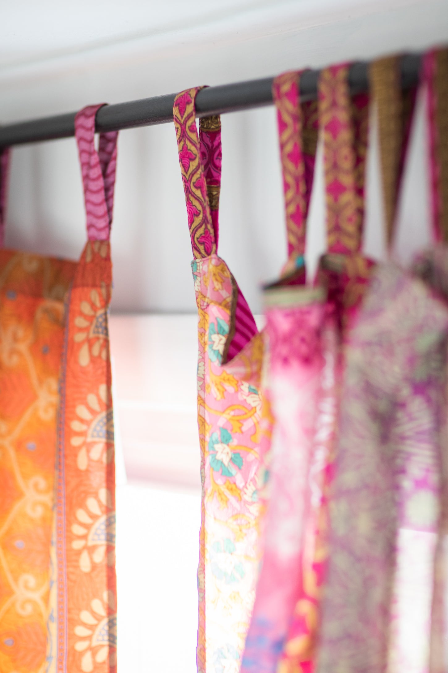 close up of the hanging tabs of recycled silk panel curtains