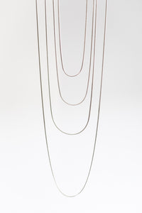 assorted sterling silver chains