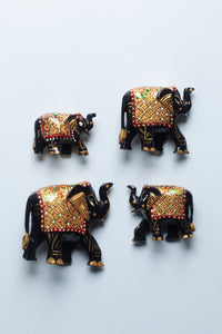 Wooden hand painted elephant family in black