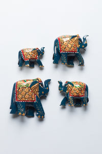 Wooden hand painted elephant family in blue
